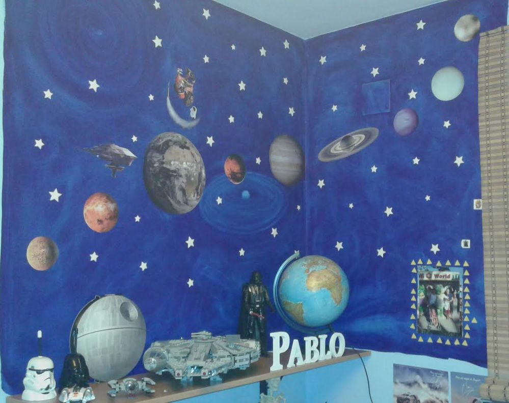 Interior de una habitación infantil con temática espacial con estrellas que  brillan en la oscuridad y decoración de planetas generada por ia